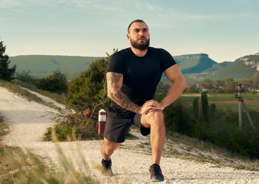 male-athlete-warming-up-before-start-running-in-mo-2023-11-27-05-32-27-utc (1)