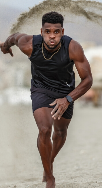 a-man-sprinting-on-the-sandy-shores-of-playa-del-z-2025-03-09-06-53-34-utc (1)